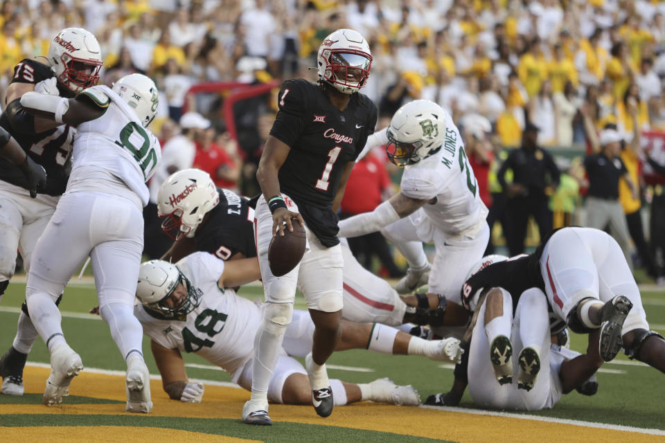 Houston quarterback Donovan Smith (1) scores on a two-point conversion against Baylor in overtime during an NCAA college football game, Saturday, Nov.4, 2023, in Waco, Texas. (Rod Aydelotte/Waco Tribune-Herald via AP)