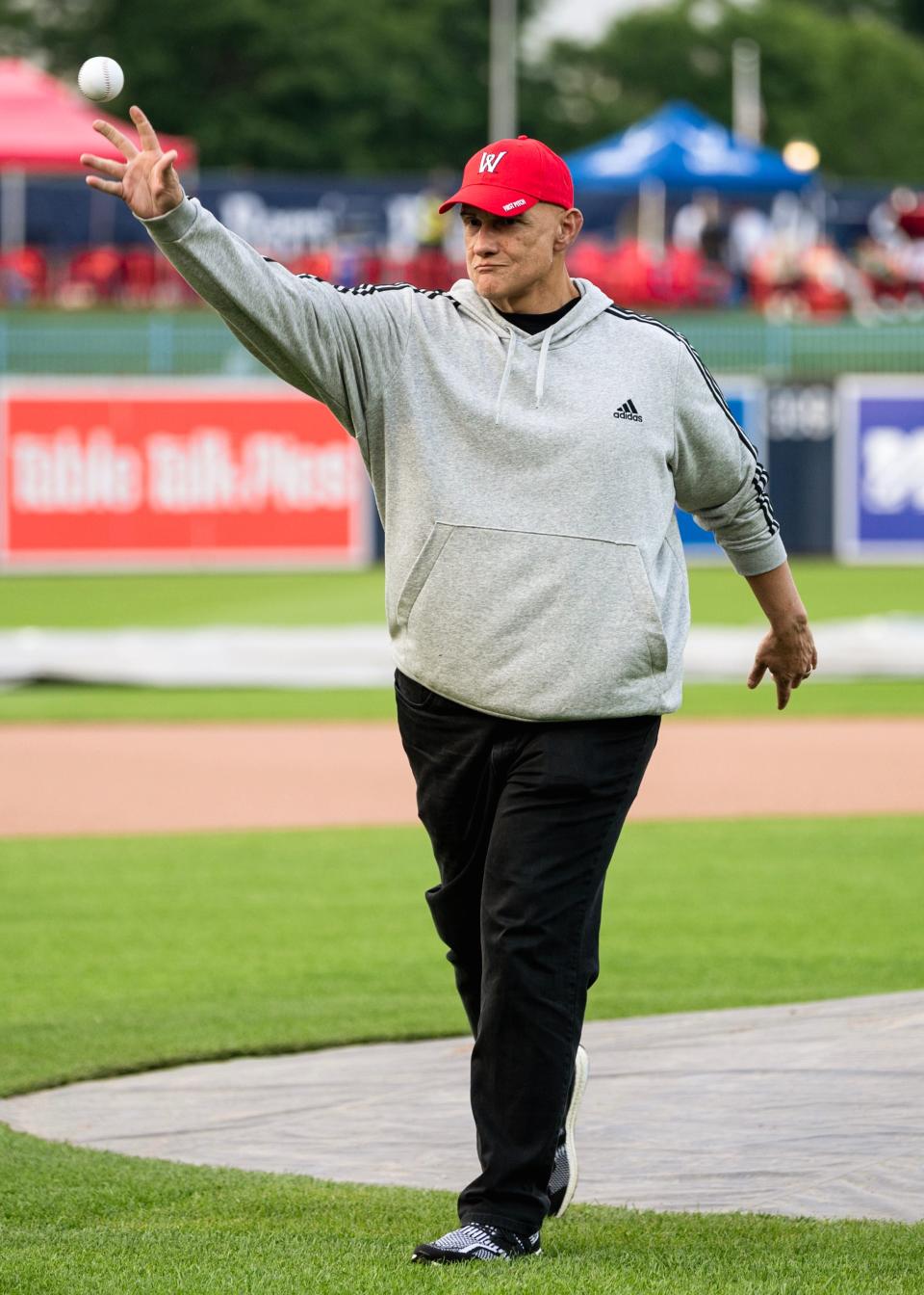 UMass men's basketball coach Frank Martin throws out the ceremonial first pitch at the WooSox game on June 8, 2023, at Polar Park.