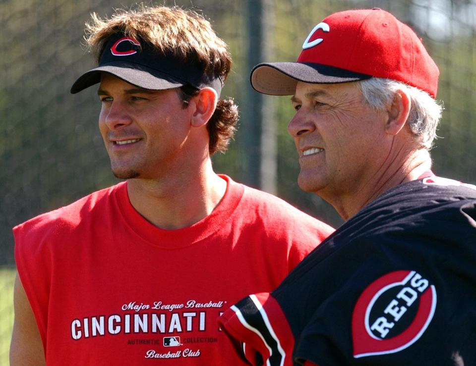 Aaron Boone (left) with his manager/father Bob Boone at the Reds Sarasota Training Complex. Wednesday Feb. 27, 2002.