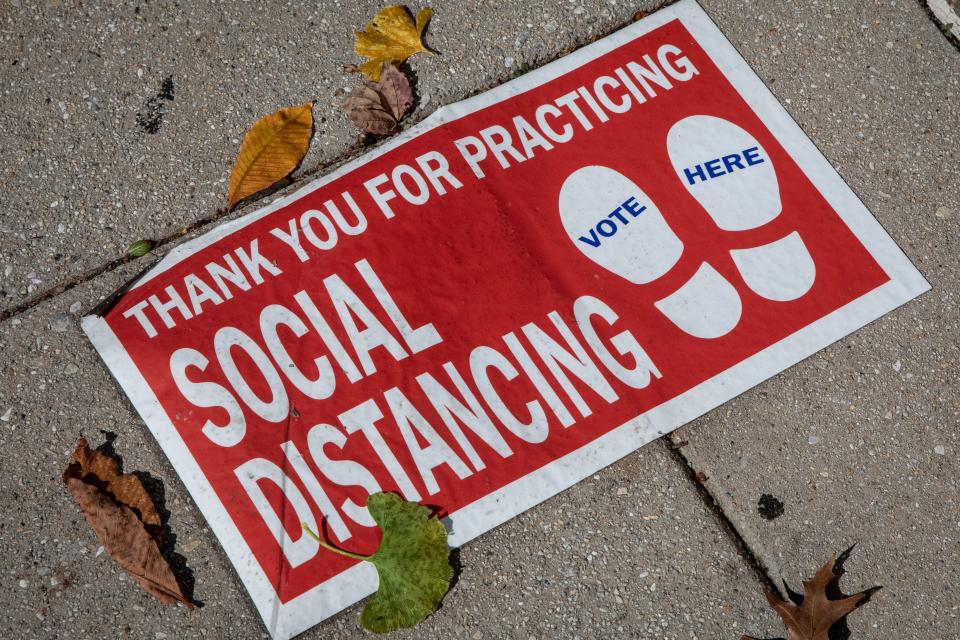 A social distancing sign outside a polling center in Washington D.C., November 2, 2020.