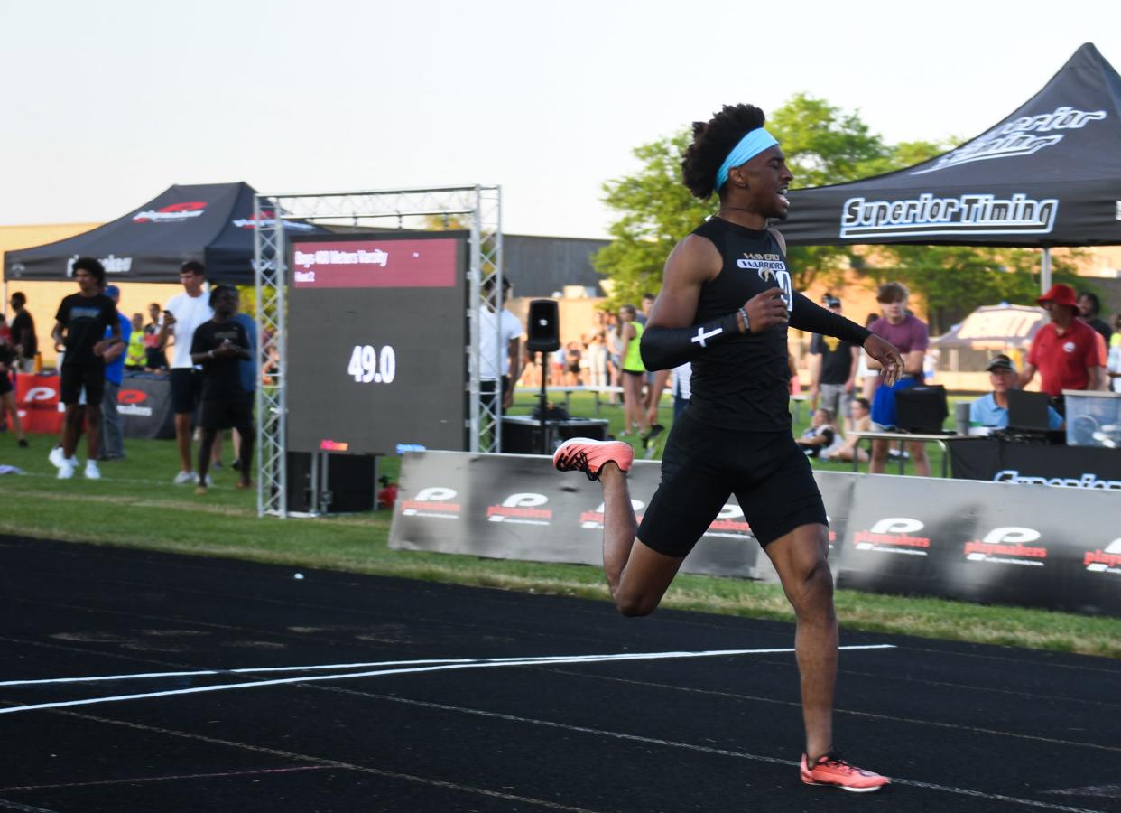 Evan Walker of Waverly coasts to a 49.35 first place in the 400 meter run, Tuesday, May 30, 2023, during the Greater Lansing Honor Roll Meet at Waverly.