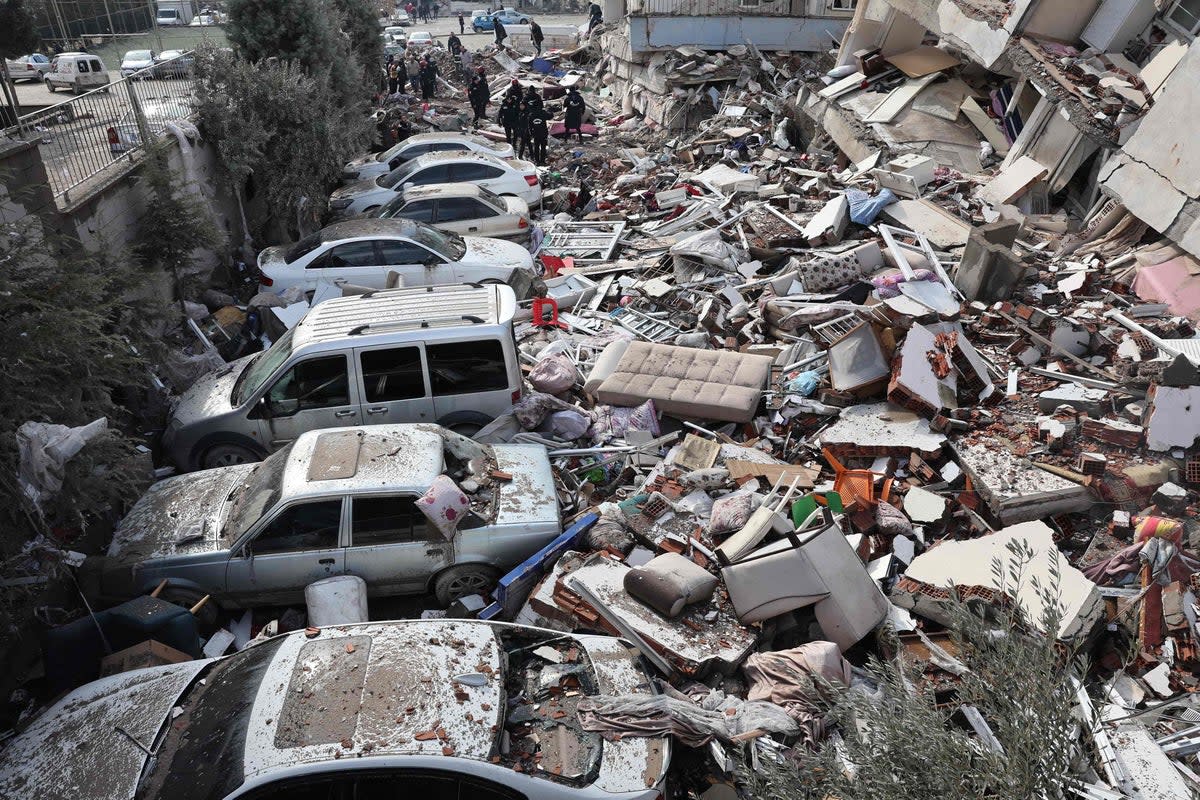 Vehicles are crushed under the rubble of collapsed buildings in Kahramanmaras (AFP/Getty)