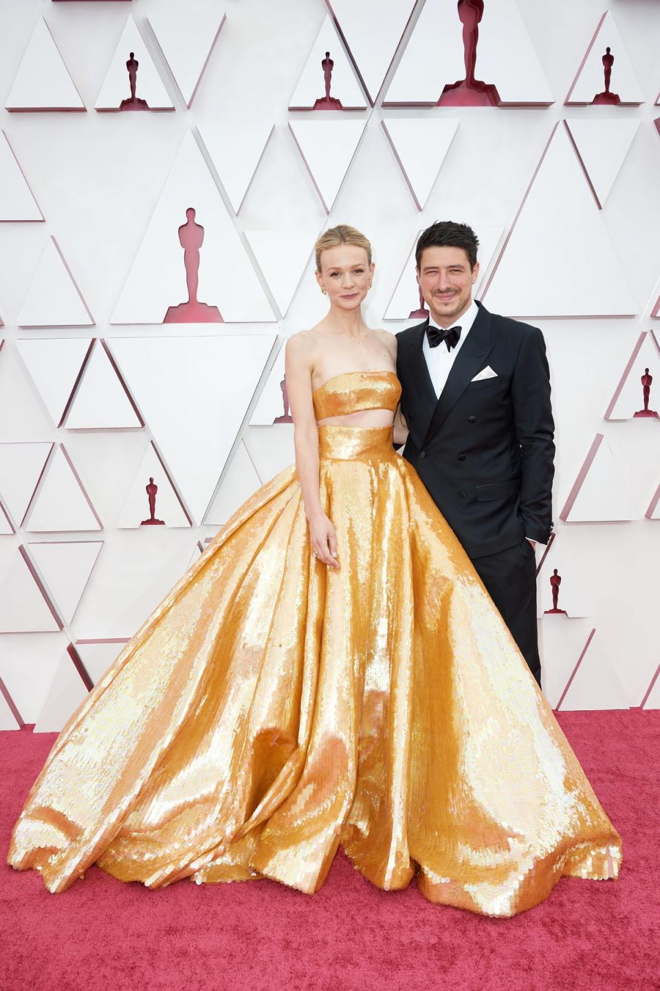 Marcus Mumford and his wife, Carey Mulligan. (via REUTERS)