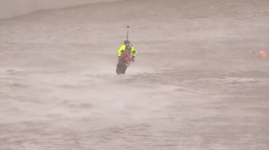 Firefighters rescue woman from storm-flooded L.A. River