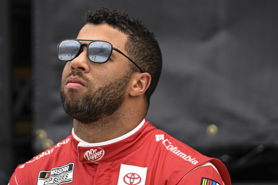 Bubba Wallace looks on prior to a NASCAR Cup Series auto race at Darlington Raceway, Sunday, May 14, 2023, in Darlington, S.C. (AP Photo/Matt Kelley)