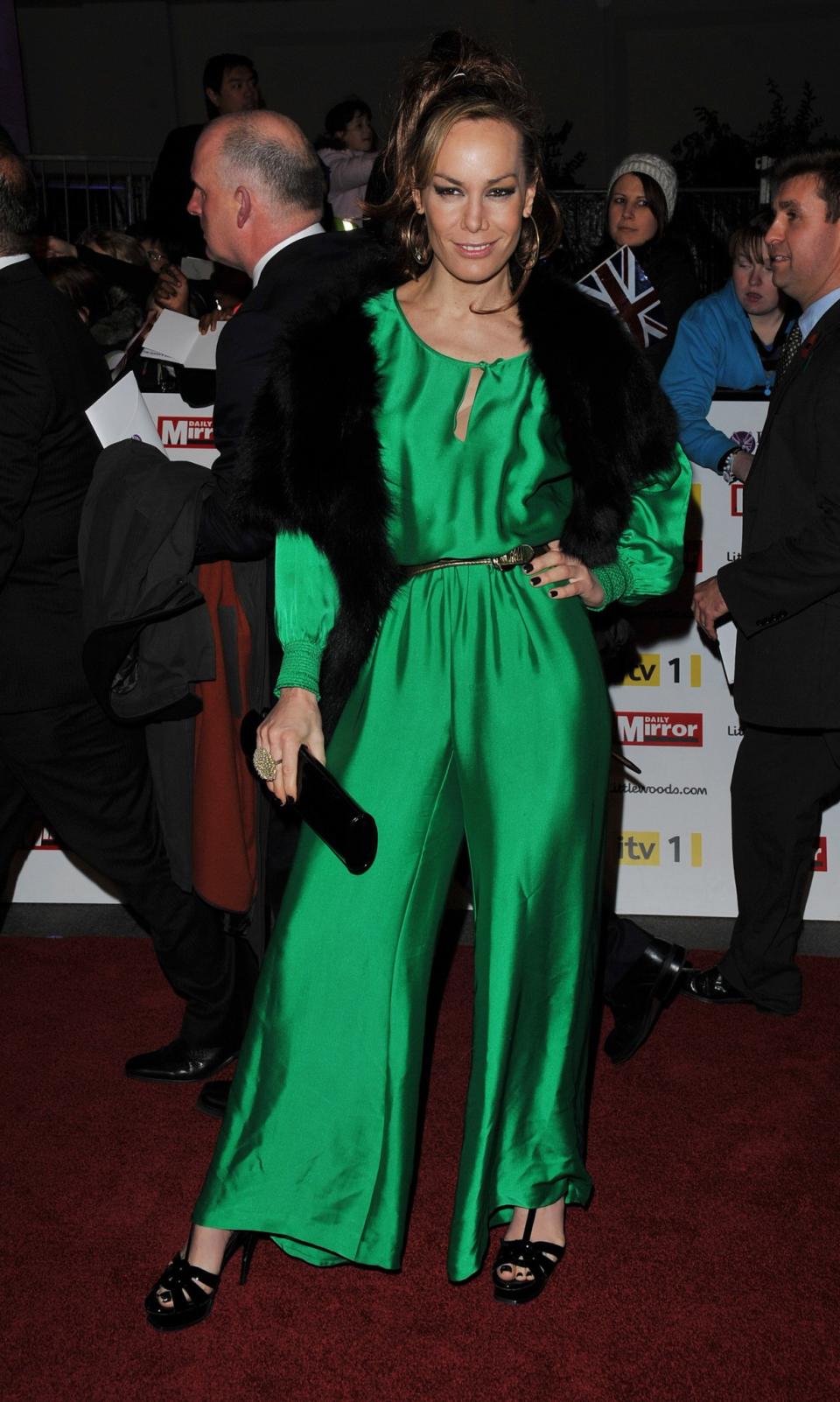 Tara worked block colours like this satin emerald jumpsuit.