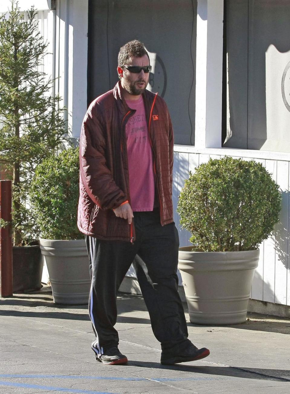 <p>Sandler, we’d recognize those track pants anywhere! (Photo: Bauer-Griffin/FilmMagic)</p>