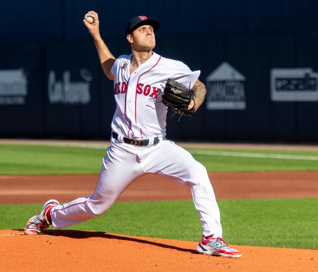 Tanner Houck of the Boston Red Sox pitches in the first inning