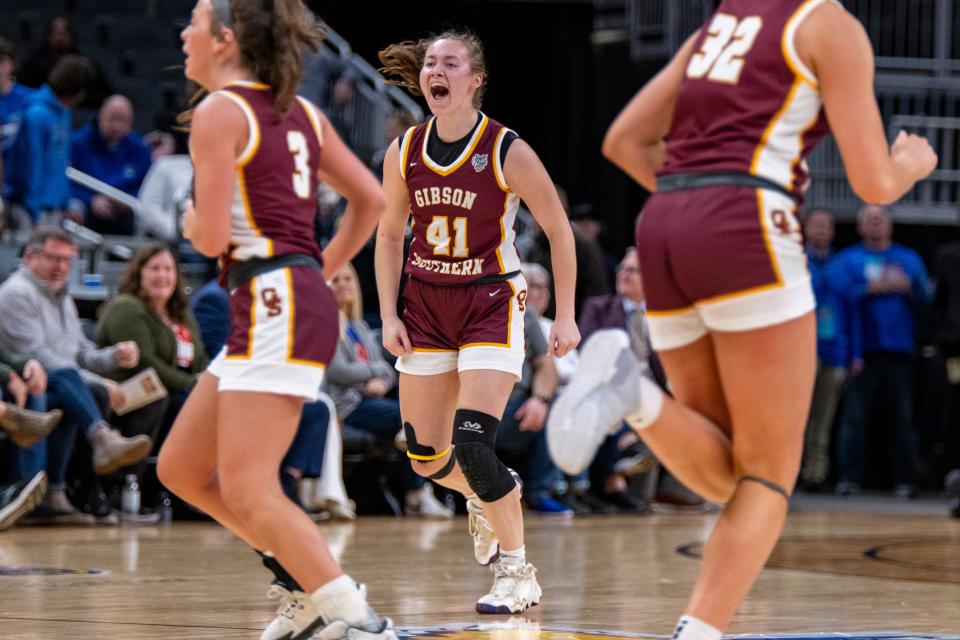 Gibson Southern High School senior Chloey Graham (41) react after regaining control of the ball late during the second half of an IHSAA class 3A girls’ basketball state finals game against Norwell High School, Saturday, Feb. 24, 2024, at Gainbridge Fieldhouse, in Indianapolis. Gibson Southern won, 63-60.