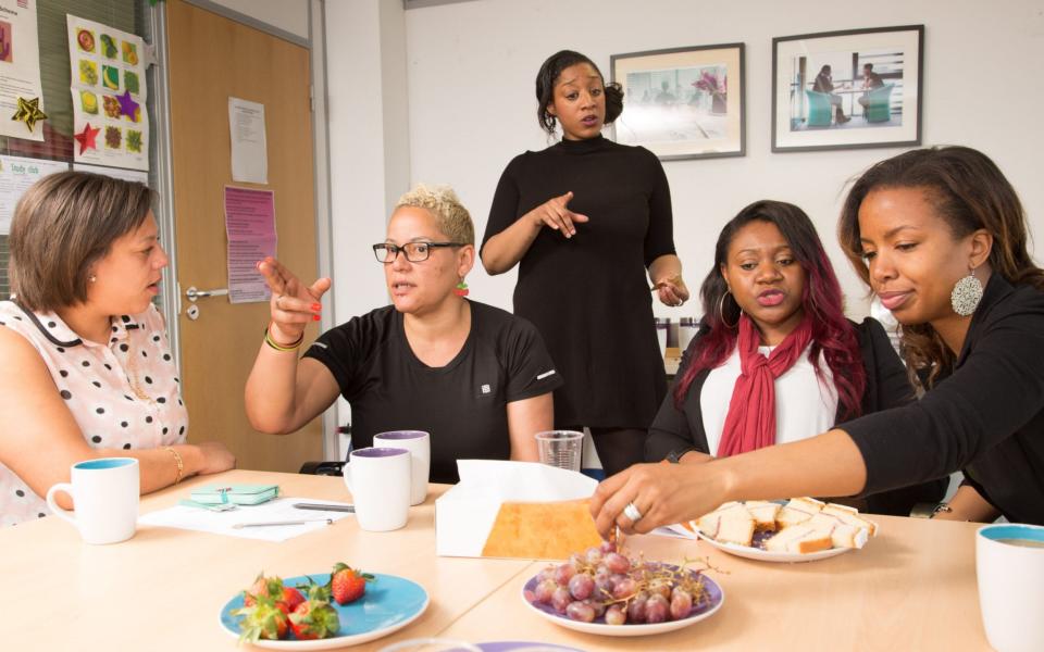 A support group meeting at the Gaia Centre, which is run by Refuge - Julian Nieman