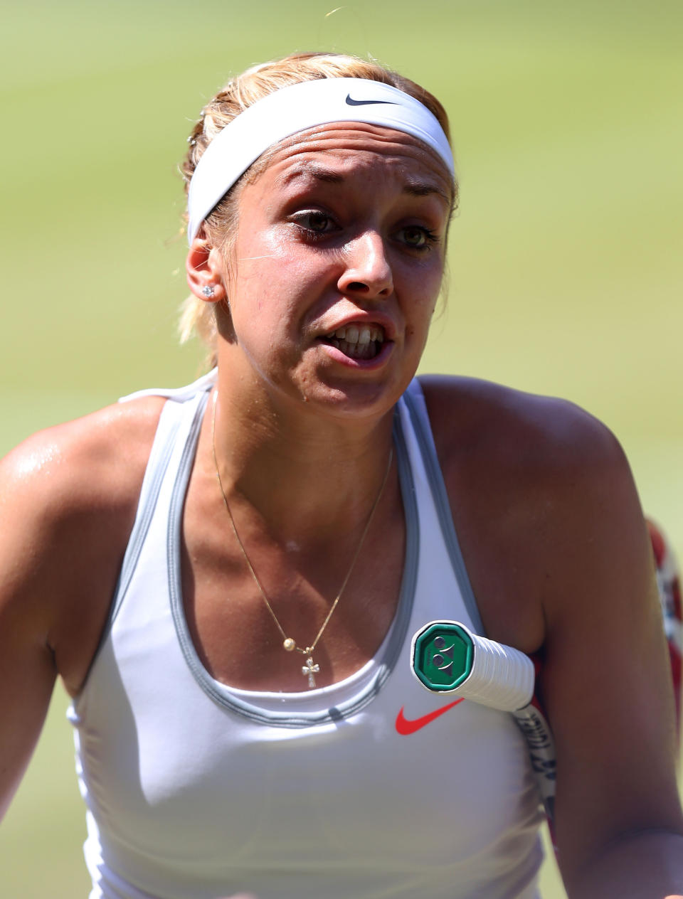 Germany's Sabine Lisicki reacts during her match against France's Marion Bartoli during day twelve of the Wimbledon Championships at The All England Lawn Tennis and Croquet Club, Wimbledon.