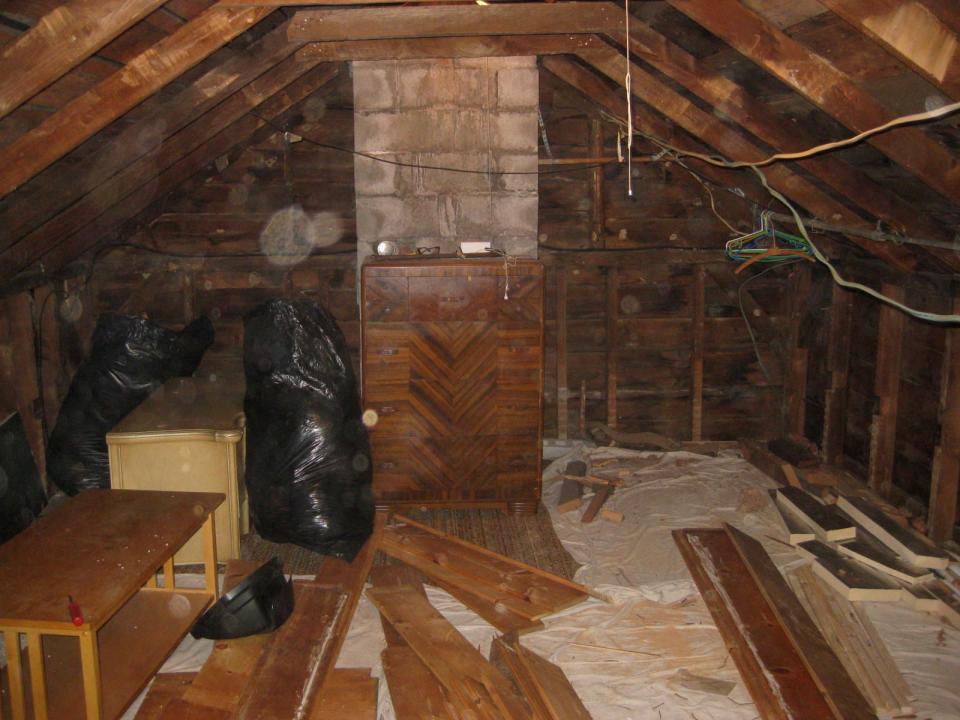 The attic was creepy and in a terrible condition when the couple first purchased the house.