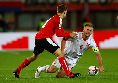 Soccer Football - 2018 World Cup Qualifications - Europe - Austria vs Serbia - Ernst Happel Stadion, Vienna, Austria - October 6, 2017 Serbia’s Branislav Ivanovic in action with Austria’s Louis Schaub REUTERS/Leonhard Foeger