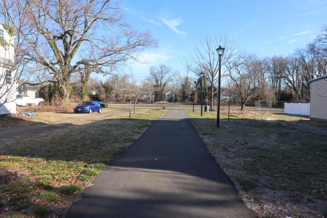 A view of where the West End Community Center would have stood, now being a pathaway to the park
