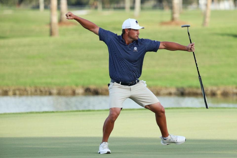 Bryson DeChambeau celebrates a birdie putt at the 18th hole of the Trump Doral Blue Monster Course during the 2023 LIV Golf Team Championship.