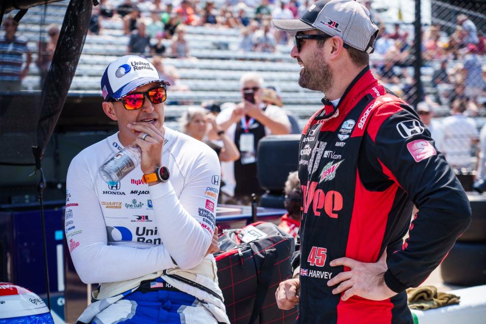 Rahal Letterman Lanigan Racing drivers Graham Rahal (15) and Jack Harvey (45) talk along pit lane Friday, May 20, 2022, as various teams take to the track during Fast Friday practice in preparation for the 106th running of the Indianapolis 500 at Indianapolis Motor Speedway.