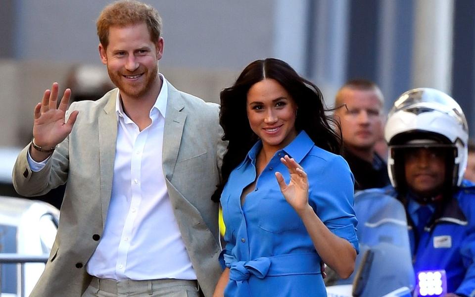 The Duke and Duchess of Sussex, Prince Harry and his wife Meghan, pictured arriving at District Six in Cape Town, on the first day of their South African tour in September 2019 - Reuters