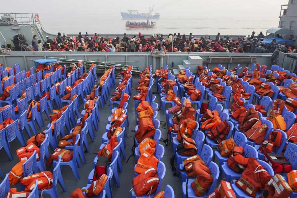 Life vests are placed on chairs as Rohingya refugees headed to the Bhasan Char island arrive to board navy vessels from the south eastern port city of Chattogram, Bangladesh, Monday, Feb.15,2021. Authorities sent a fourth group of Rohingya refugees to the newly developed island in the Bay of Bengal on Monday amid calls by human rights groups for a halt to the process. (AP Photo)