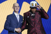 Bennedict Mathurin poses for a photo with NBA Commissioner Adam Silver after being selected sixth overall by the Indiana Pacers in the NBA basketball draft, Thursday, June 23, 2022, in New York. (AP Photo/John Minchillo)