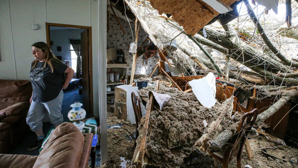 Jessie Perez and her aunt, Rebecca Aldridge, hid in a closet when severe weather came through Milton, Kentucky, on Thursday. - Michael Clevenger/Courier Journa/USA Today Network