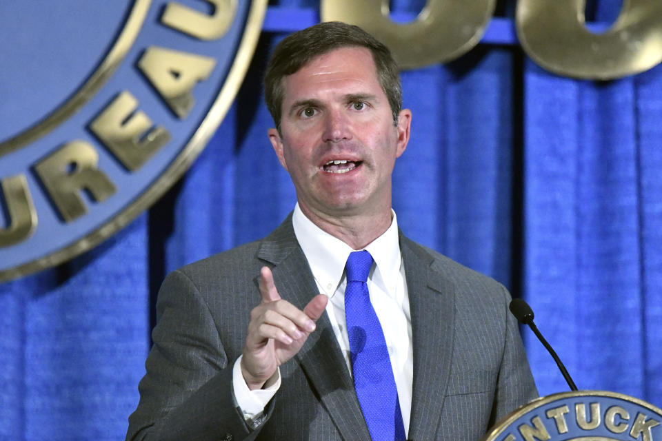 Kentucky Gov. Andy Beshear addresses the audience at the Kentucky Farm Bureau Ham Breakfast at the Kentucky State Fair in Louisville, Ky., Thursday, Aug. 25, 2022. (AP Photo/Timothy D. Easley)