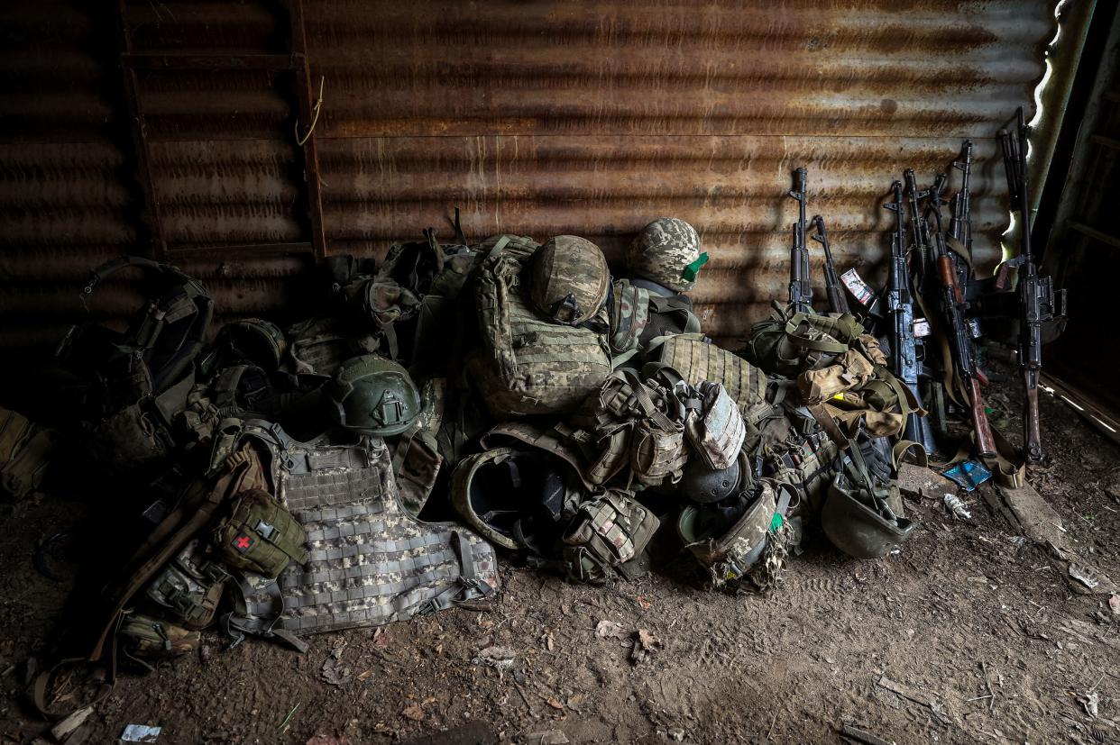 Military equipment removed from wounded Ukrainian servicemen seen at a frontline medical stabilisation point near Bakhmut, Donetsk region (AFP via Getty Images)