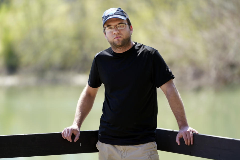 Daniel Roberts poses for a picture Monday, April 5, 2021, in McMinnville, Tenn. Roberts received a COVID vaccine over the objections of his family, who are against being vaccinated. “Five hundred thousand people have died in this country. That’s not a hoax,” Roberts said, speaking of the conspiracy theories he hears from family and friends. ”I don't know why I didn’t believe all of it myself. I guess I chose to believe the facts.” (AP Photo/Mark Humphrey)