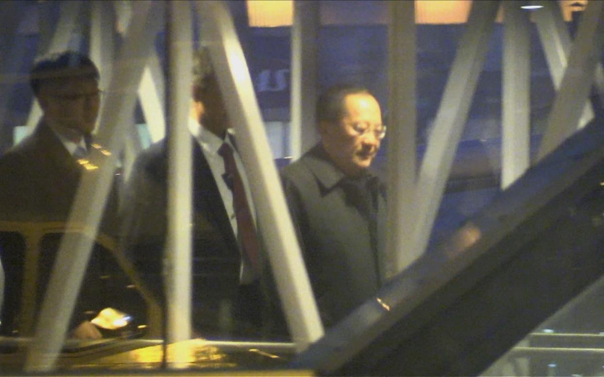 A video grab shows North Korean Foreign Minister Ri Yong-ho and his delegation arrive at the airport in Stockholm - AFP