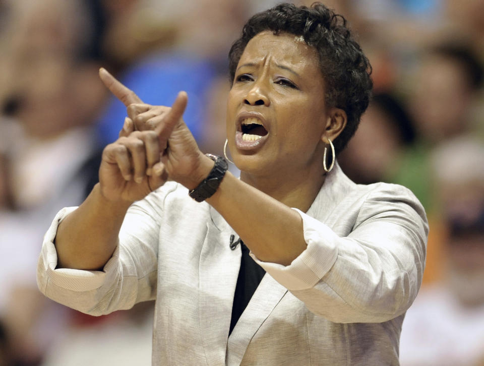 FILE - In this June 28, 2011, file photo, Los Angeles Sparks coach Jennifer Gillom gestures during the second half of a WNBA basketball game against the Connecticut Sun in Uncasville, Conn. Gillom says everything is a process. Dawn Staley becoming the first Black female head coach of the U.S. women's Olympic basketball team is no different. (AP Photo/Jessica Hill, File)