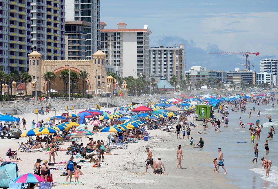 Beachgoers line the Daytona Beach shoreline over Labor Day weekend, Saturday, Sept. 3, 2022.