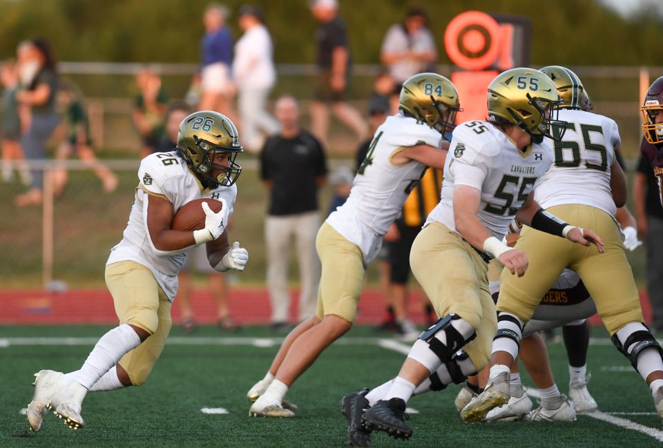 Jefferson's Daevion Simonsen (26) runs with the football in Harrisburg on Friday, Aug. 25, 2023.