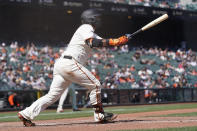 San Francisco Giants' Brandon Crawford watches his three-run home run against the Colorado Rockies during the sixth inning of a baseball game in San Francisco, Saturday, April 10, 2021. (AP Photo/Jeff Chiu)