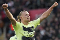 Manchester City's Erling Haaland celebrates after scoring his side's third goal during the English Premier League soccer match between Southampton and Manchester City at St Mary's Stadium in Southampton, England, Saturday, April 8, 2023. (AP Photo/Frank Augstein)