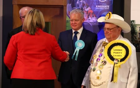 Brexit Party candidate Mike Greene shakes hands with Labour Party candidate Lisa Forbes after she won the Peterborough by-election at the KingsGate Centre in Peterborough