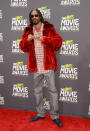 Snoop Lion (nee Dogg) wore the curious combination of red plaid and mink.