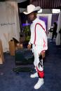 <p>During this quick photo-op, Lil Nas X showed off more of his 21st-century ranchero style. </p>
