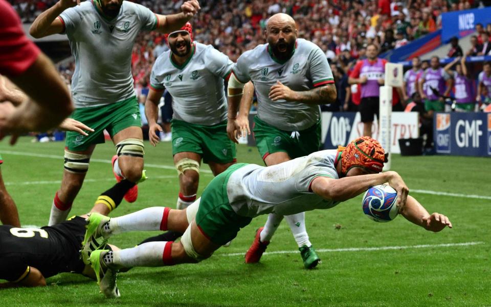 Portugal flanker Nicolas Martin dives over for a deserved try