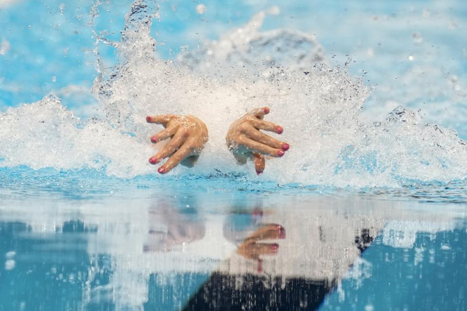 Gretchen Walsh competes in the Women's 100 butterfly semifinals heat Saturday, June 15, 2024, at the US Swimming Olympic Trials in Indianapolis. (AP Photo/Michael Conroy)