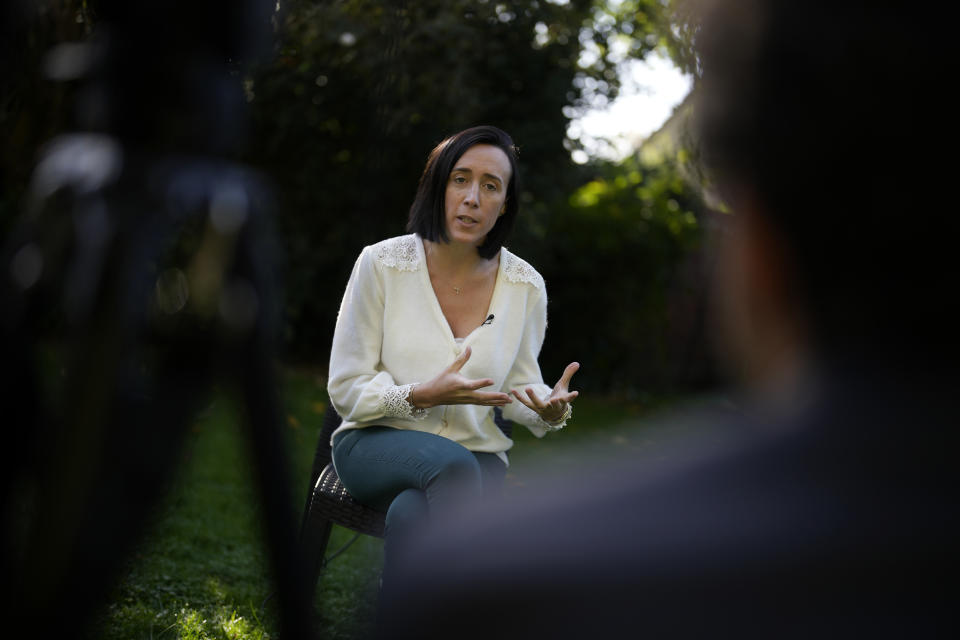 Ophelie Toulliou, sister of a victim of the Rio-Paris plane crash, speaks during an interview with The Associated Press in Sannois, outside Paris, Friday, Oct. 7, 2022. It was the worst plane crash in Air France history, killing people of 33 nationalities and having lasting impact. It led to changes in air safety regulations, how pilots are trained and the use of airspeed sensors. (AP Photo/Christophe Ena)