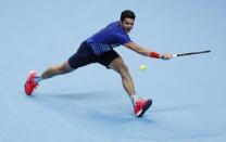 Britain Tennis - Barclays ATP World Tour Finals - O2 Arena, London - 15/11/16 Canada's Milos Raonic in action during his round robin match with Serbia's Novak Djokovic Reuters / Stefan Wermuth Livepic