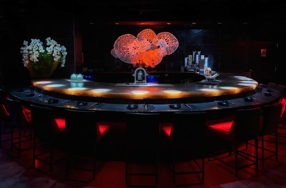 The dark, dramatic, speakeasy-style space of the entertaining (and delicious) Nossa Omakase in Miami Beach.