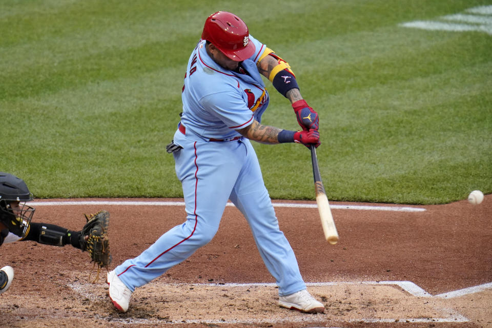 St. Louis Cardinals' Yadier Molina singles off Pittsburgh Pirates starting pitcher Jose Quintana, driving in a run, during the second inning of a baseball game in Pittsburgh, Saturday, May 21, 2022. (AP Photo/Gene J. Puskar)