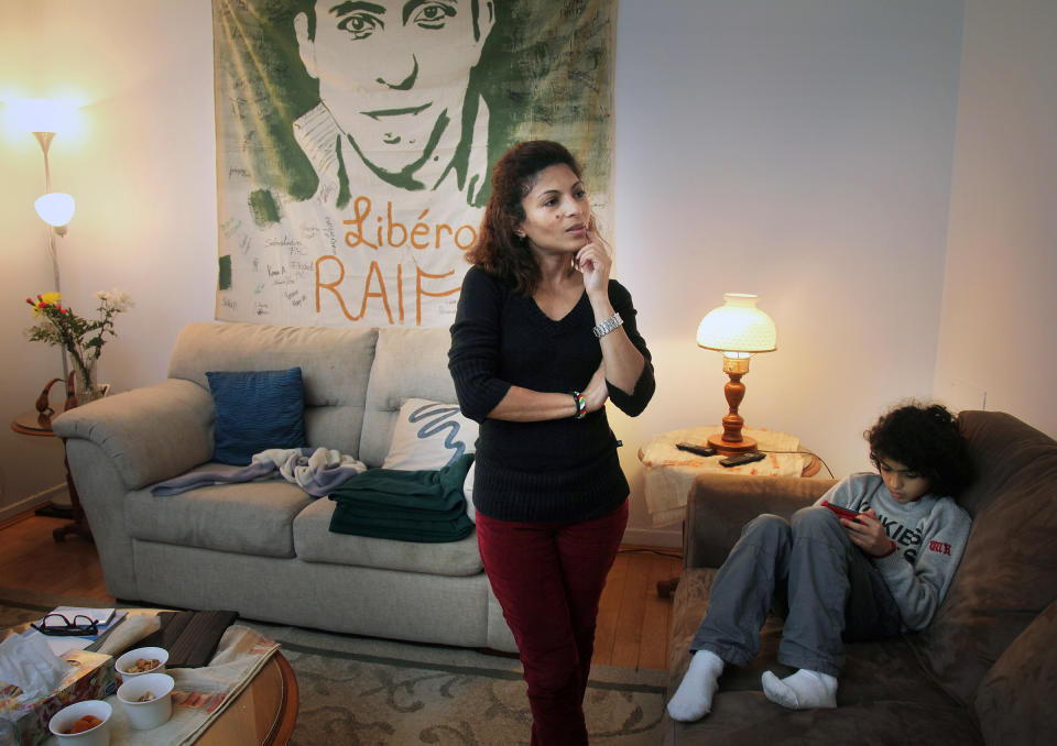 Ensaf Haidar in her home in a small basement apartment in the city of Sherbrooke, Quebec on Jan 19, 2015. She has continued to advocate for her husband's release with the help of Amnesty International. She has been accepted into Canada as a refugee.<span class="copyright">Roger Lemoyne—Redux</span>