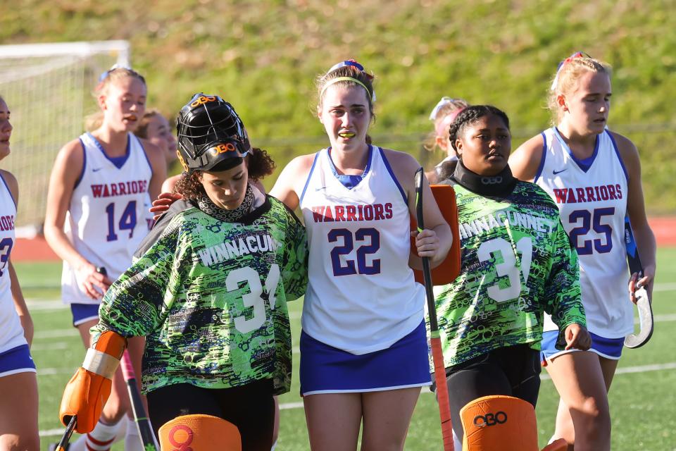 Winnacunnet senior captain Abby Wilber, center, was named a Division I field hockey all-state first-team selection.