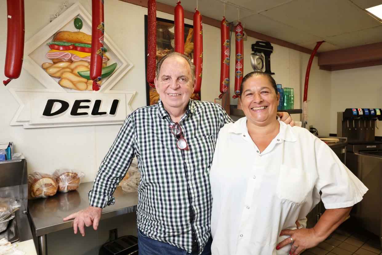 From left, Steve Robbins, owner of Maxie's Deli, 117 Sharon St., Stoughton, with cook Joyce Ann Silva, on Friday, Aug. 12, 2022.