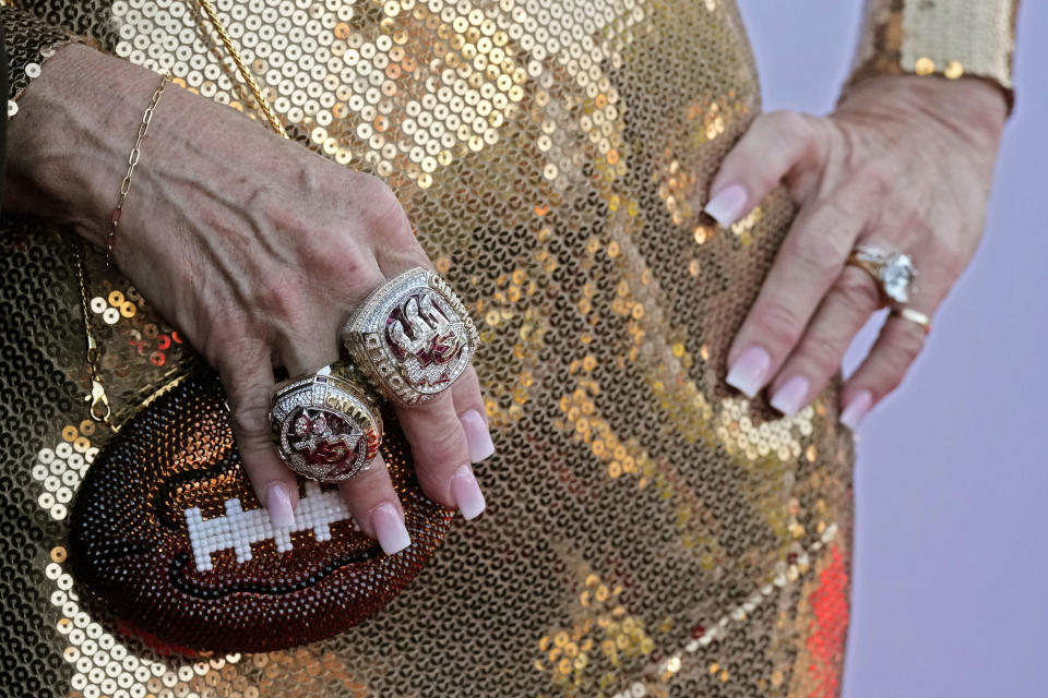 Kansas City Chiefs head coach Andy Reid's wife Tammy arrives on the red carpet before a ceremony for team members to receive their championship rings for winning NFL's Super Bowl 58 football game Thursday, June 13, 2024, in Kansas City, Mo. (AP Photo/Charlie Riedel)