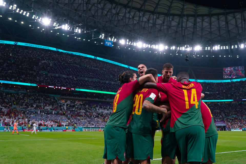 LUSAIL CITY, QATAR - NOVEMBER 28: Bruno Fernandes of Portugal celebrates with teammates after scoring his team's second goal during the FIFA World Cup Qatar 2022 Group H match between Portugal and Uruguay at Lusail Stadium on November 28, 2022 in Lusail City, Qatar. (Photo by Khalil Bashar/Jam Media/Getty Images)