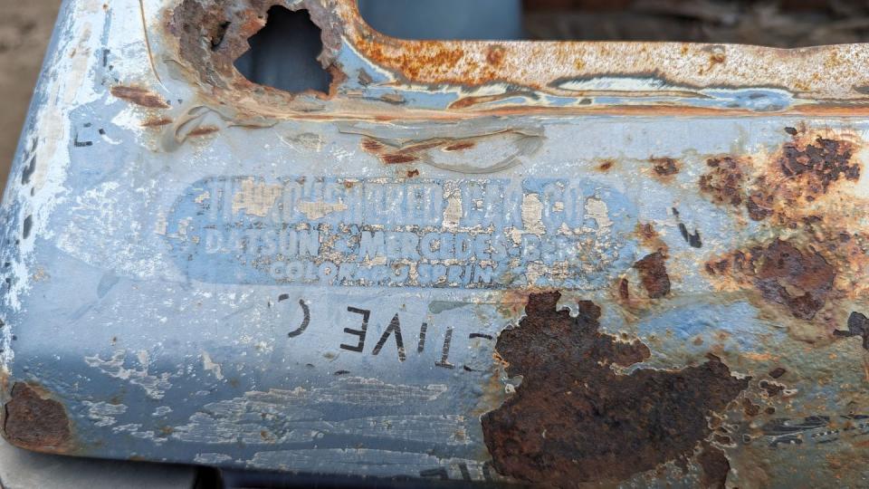 1980 datsun 210 wagon with 400k miles in colorado junkyard