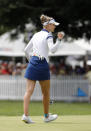 Nelly Korda reacts after sinking her putt on the 18th green during the final round of the Meijer LPA Classic golf tournament, Sunday, June 20, 2021, in Grand Rapids, Mich. (AP Photo/Al Goldis)