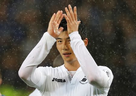 Football Soccer Britain - Leicester City v Swansea City - Premier League - King Power Stadium - 27/8/16 Swansea City's Ki Sung Yueng applauds fans after the game Reuters / Darren Staples Livepic